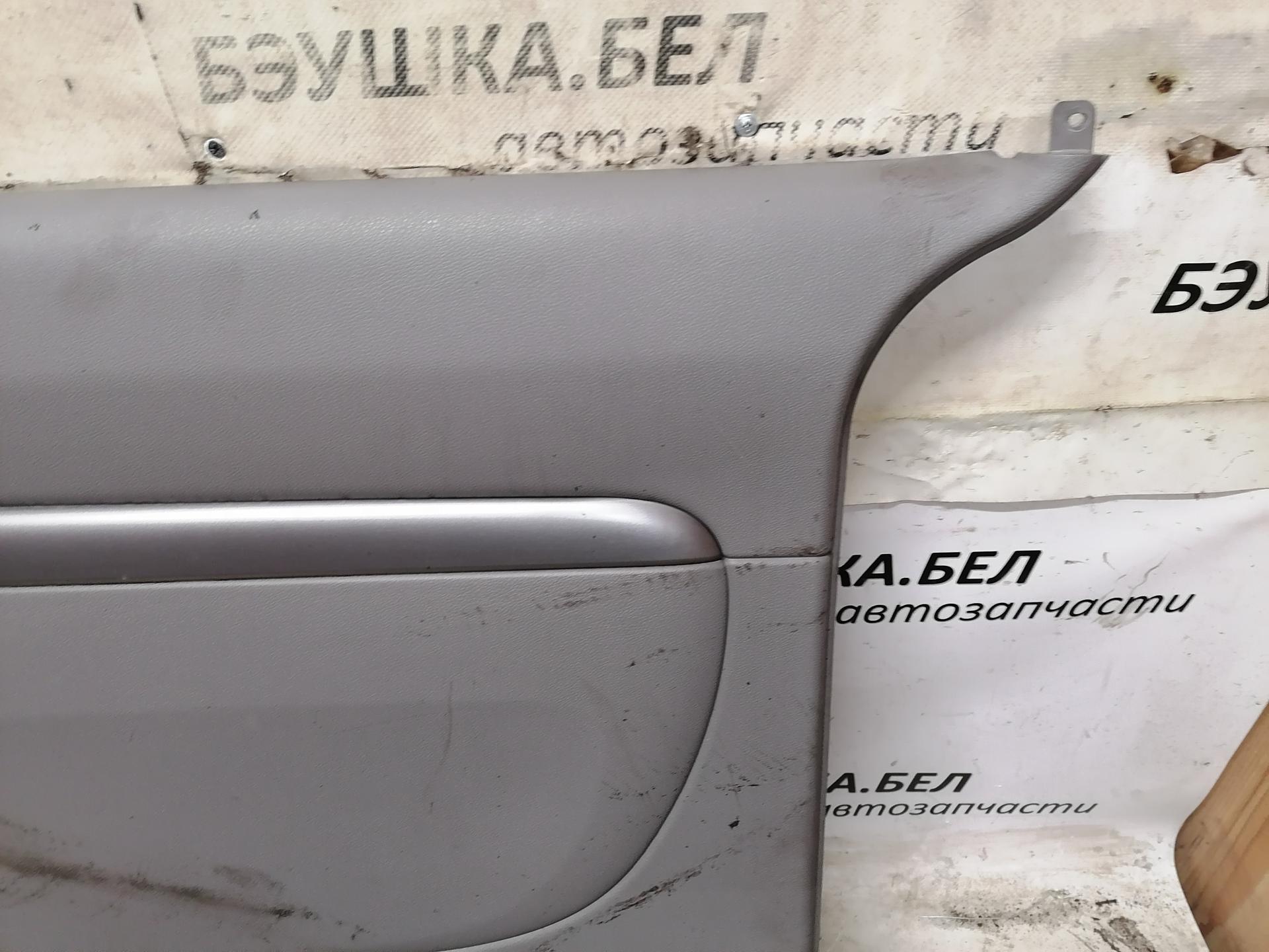 Обшивка (карта) двери задней правой Kia Carnival (Sedona) 1 купить в Беларуси
