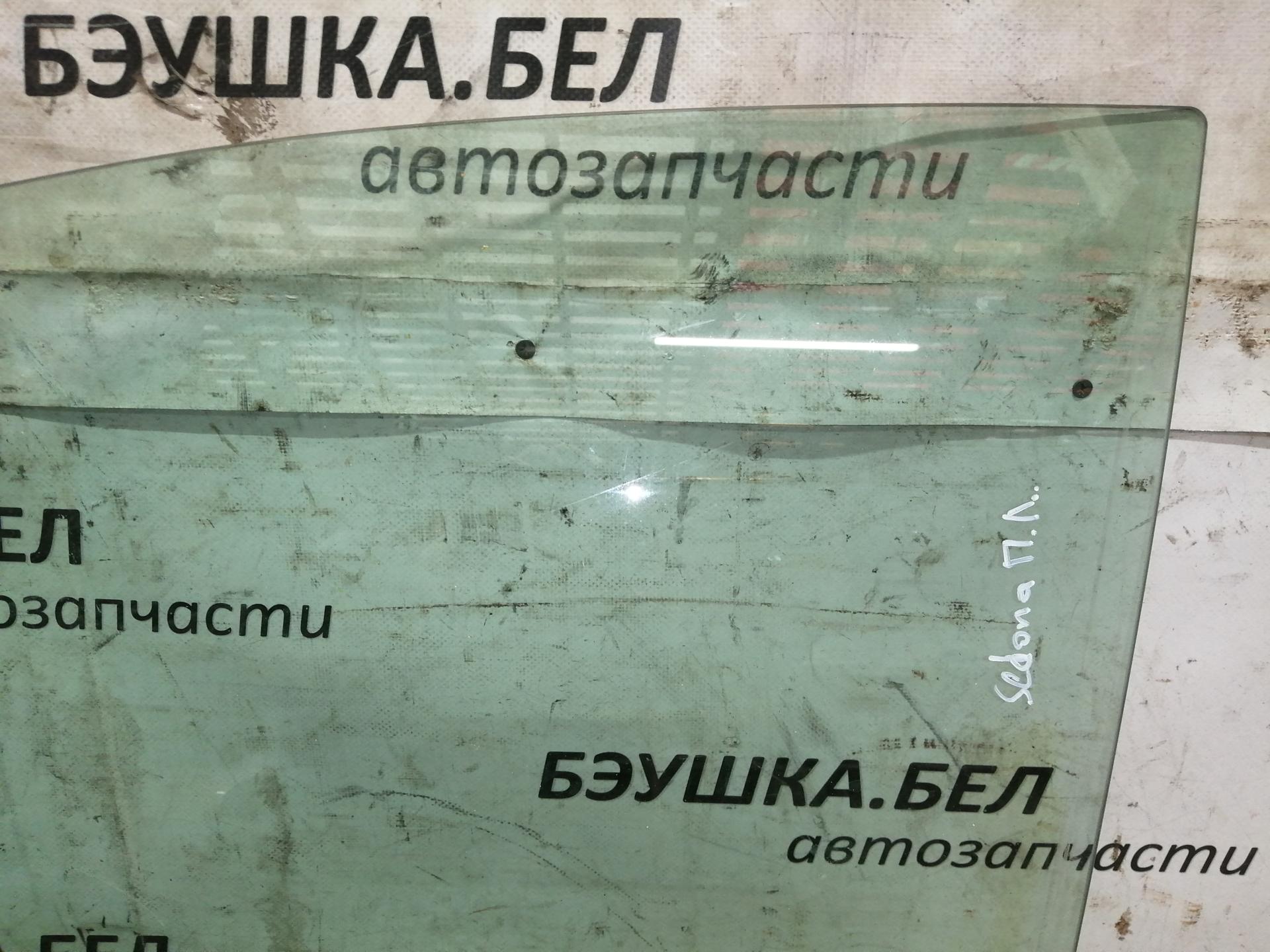 Стекло двери передней левой Kia Carnival (Sedona) 2 купить в Беларуси